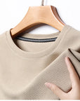 Men's Casual Waffle Knit Short Sleeve T-Shirt Round Neck Design.