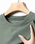Men's Casual Waffle Knit Short Sleeve T-Shirt Round Neck Design.