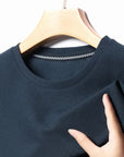 Men's Casual Waffle Knit Short Sleeve T-Shirt Round Neck Design.