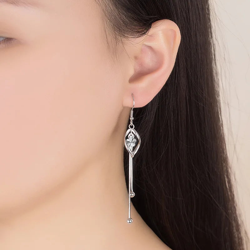 Elegant 925 Sterling Silver Hollow Leaf Flower Drop Earrings - Long, stylish jewelry for women. Perfect for any occasion!