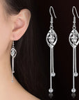 Elegant 925 Sterling Silver Hollow Leaf Flower Drop Earrings - Long, stylish jewelry for women. Perfect for any occasion!