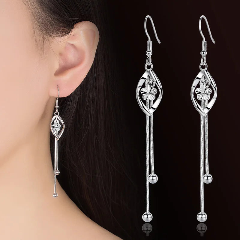 Elegant 925 Sterling Silver Hollow Leaf Flower Drop Earrings - Long, stylish jewelry for women. Perfect for any occasion!