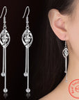 Elegant 925 Sterling Silver Hollow Leaf Flower Drop Earrings - Long, stylish jewelry for women. Perfect for any occasion!