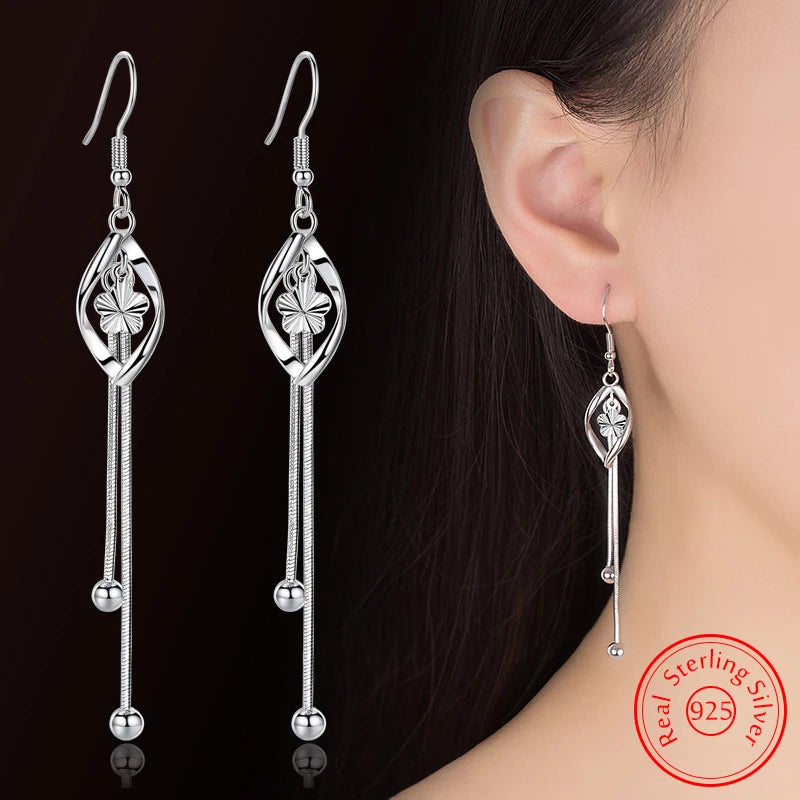 Elegant 925 Sterling Silver Hollow Leaf Flower Drop Earrings - Long, stylish jewelry for women. Perfect for any occasion!