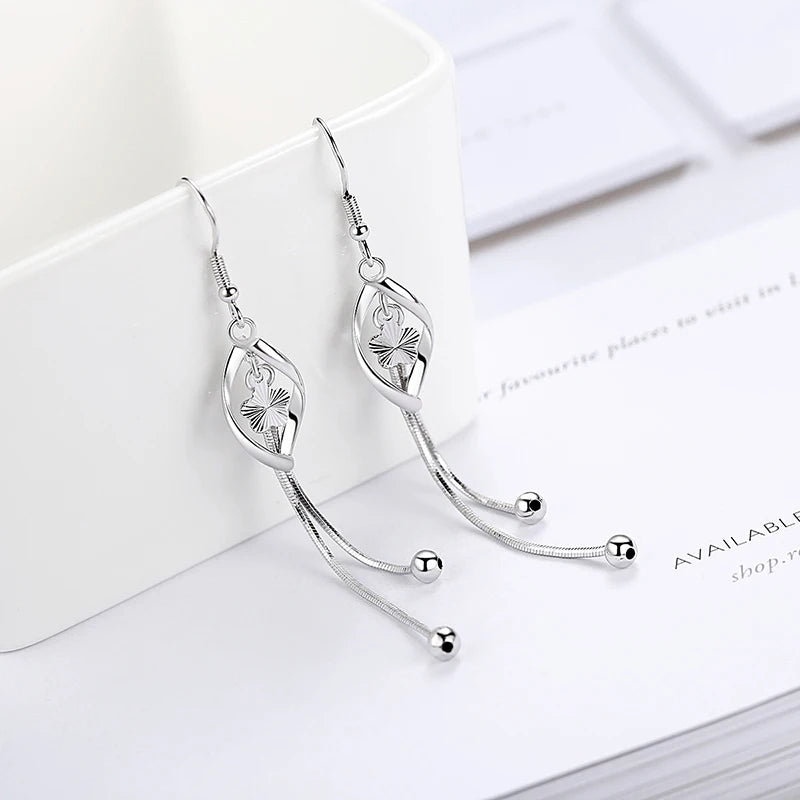 Elegant 925 Sterling Silver Hollow Leaf Flower Drop Earrings - Long, stylish jewelry for women. Perfect for any occasion!